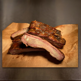 SMOKED PORK RIBS BY QUATER, HALF OR WHOLE